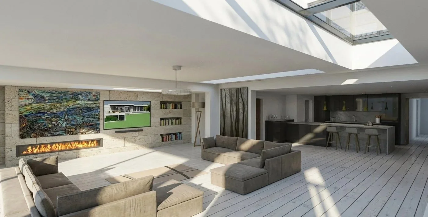 Modern living room with light-colored hardwood floors, a gray sectional sofa, a wall-mounted TV, art piece, bookshelf, fireplace, and a kitchen with bar stools in the background, illuminated by large skylights.