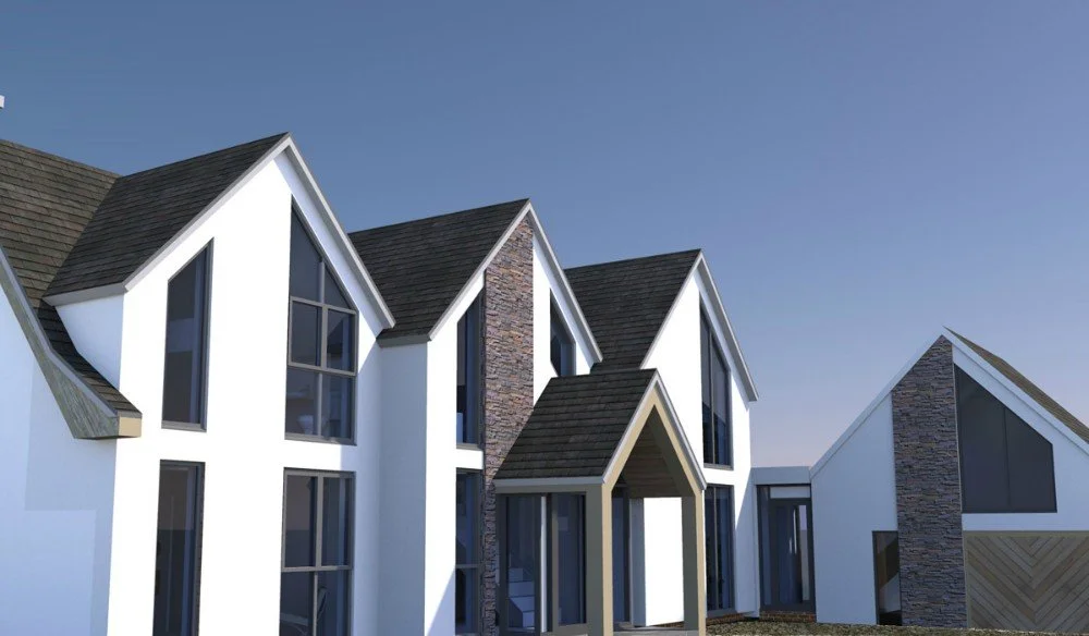 Modern multi-story houses with steep gable roofs, large windows, white exteriors, and stone accents under a clear blue sky.