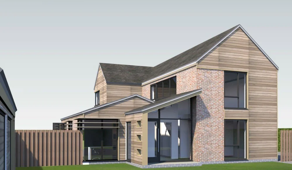 Modern two-story house with brick and wood exterior, large windows, and a sloped roof, surrounded by a wooden fence.