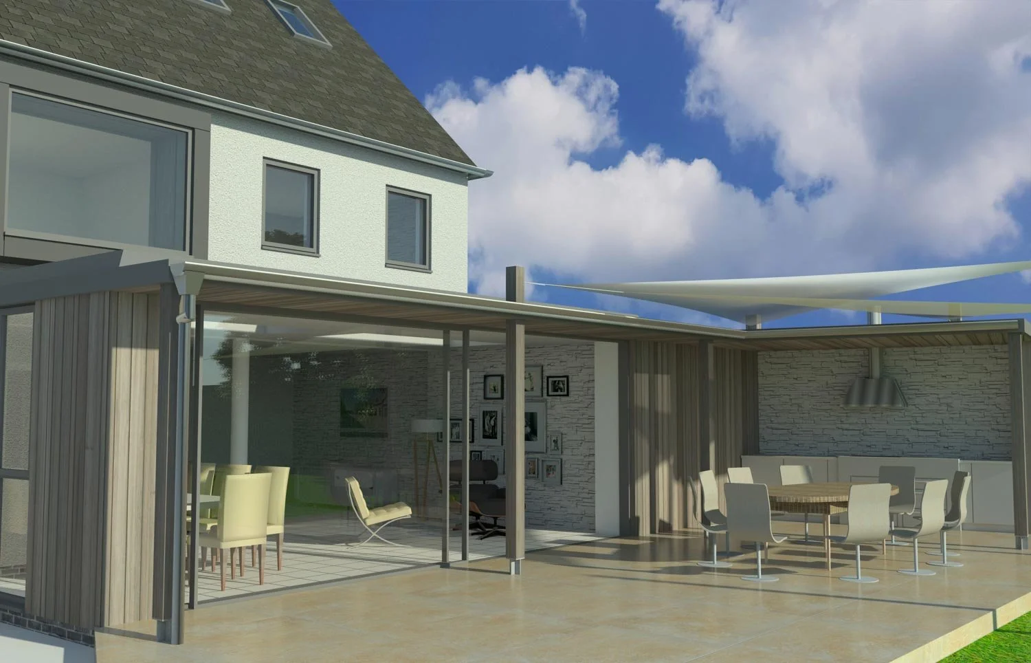 Modern house exterior with a patio area featuring outdoor dining furniture, large glass sliding doors, and a patterned stone wall. Above, a white shade sail is stretched, with a blue sky and clouds in the background.