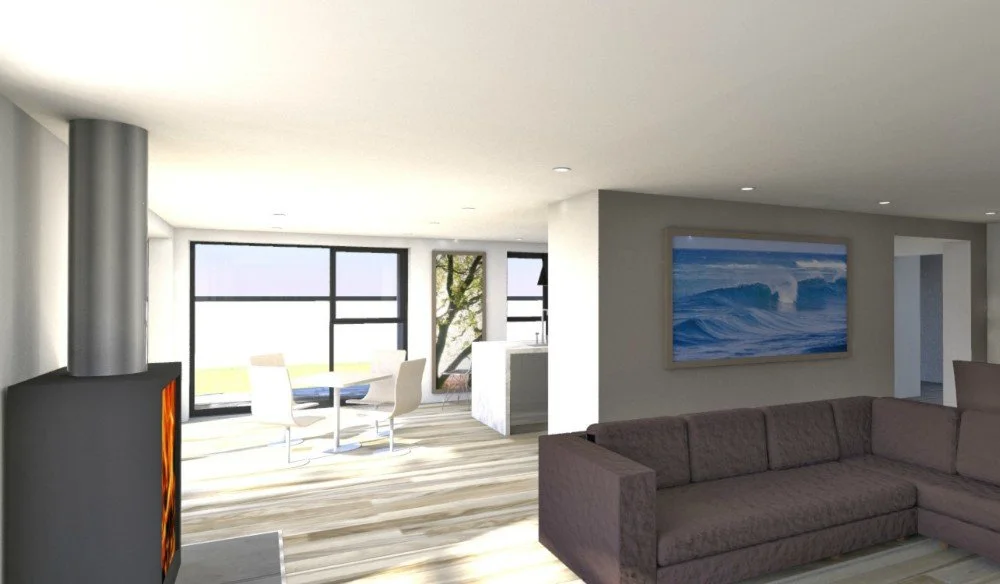 Modern living room with a gray sectional sofa, wall-mounted ocean painting, and large windows in the dining area with a table and white chairs, illuminated by natural light.