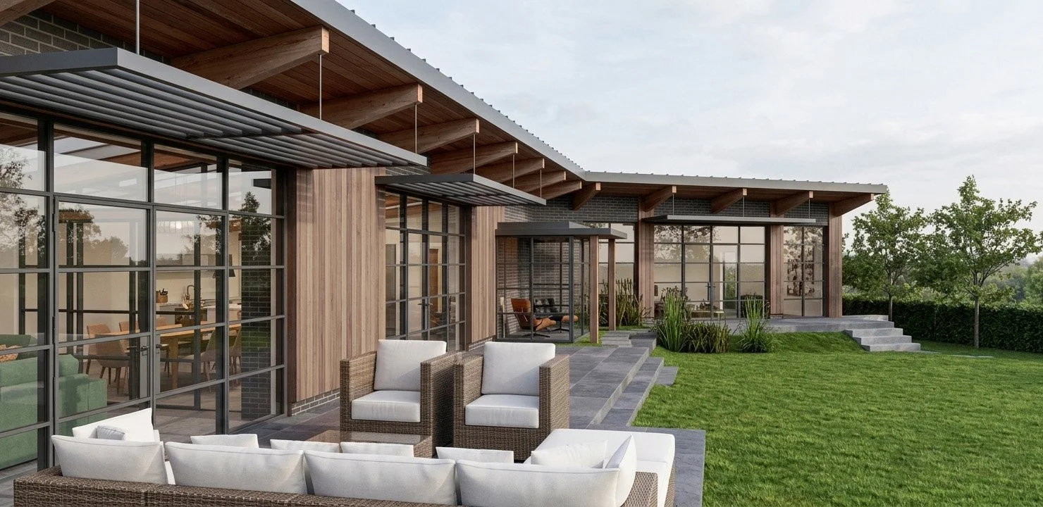 Modern house with large glass windows, wooden exterior, outdoor seating area with white cushions, and a well-maintained lawn.