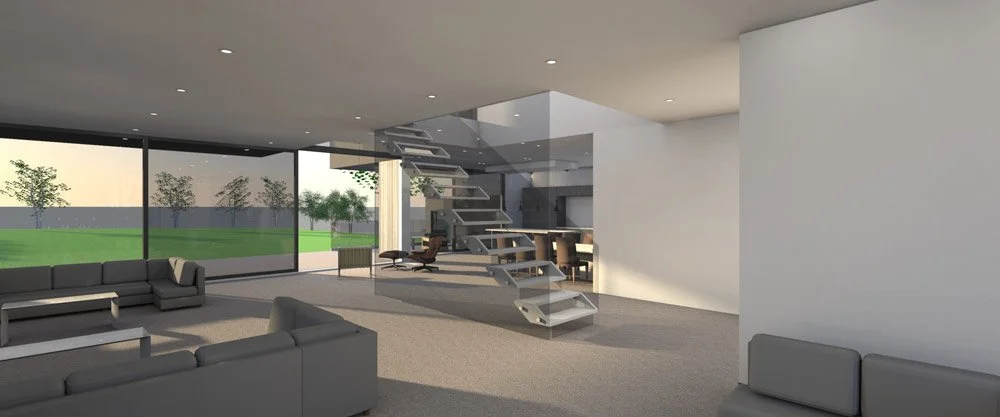 Modern living room with large glass windows, gray sofas, and a white open staircase leading to an upper level.