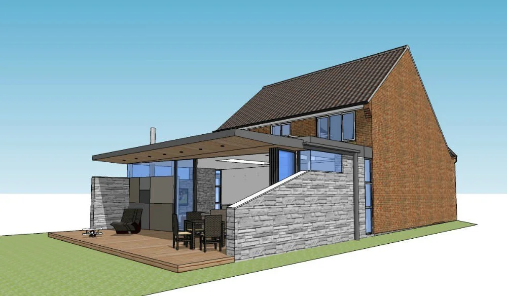 Architectural rendering of a modern two-story house with a brick exterior, large windows, a covered patio with outdoor seating, and a stone retaining wall.
