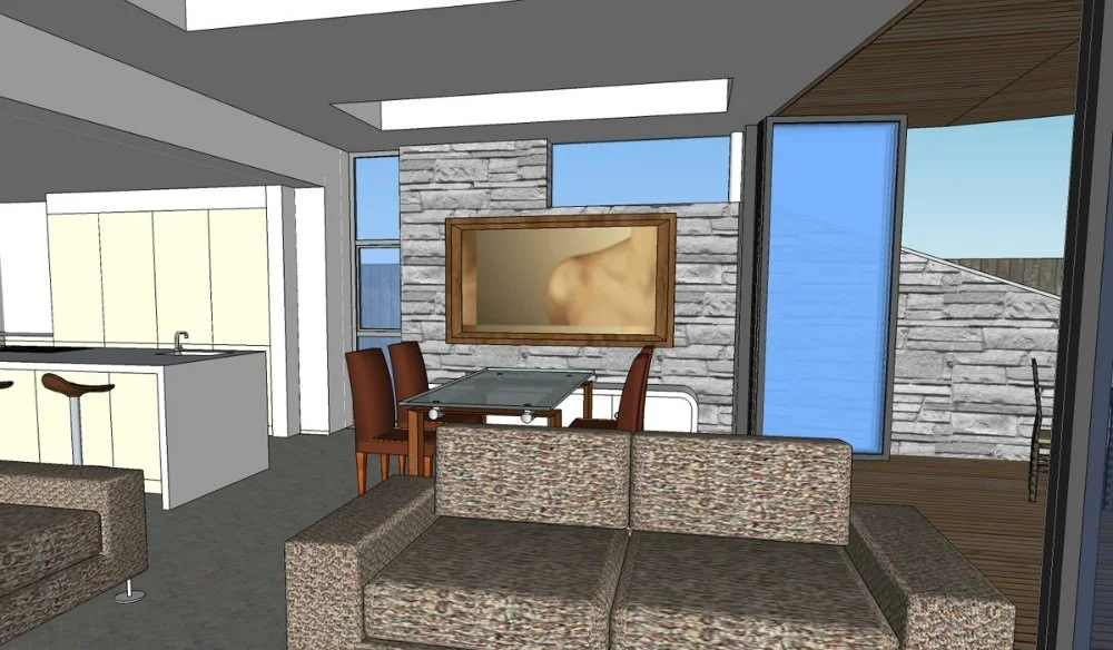 Interior view of a modern living room with a gray stone accent wall, a rectangular mirror, a dining table with four chairs, a large sliding glass door, and a sofa.