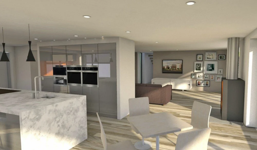 Modern open-concept kitchen and living room with marble island, dining table with four chairs, and wall of art and photos.