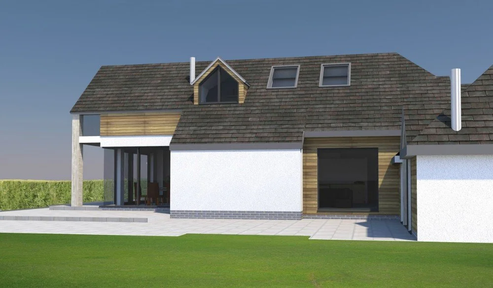 Rear view of a modern house with a pitched roof, small dormer window, skylights, sliding glass door, and chimney, set on a lawn with a paved patio area.