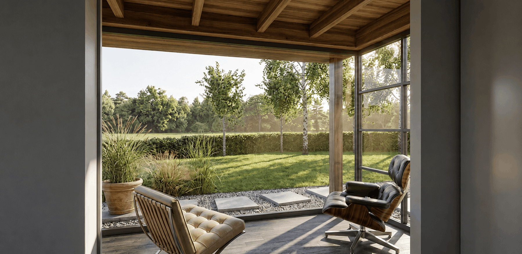 Modern home office with large glass windows overlooking a green backyard, featuring a leather office chair, a wooden lounge chair, and indoor plants.