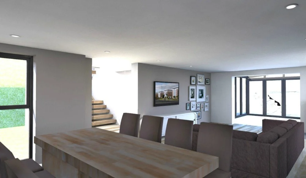 Living room with a dining table, chairs, a sofa, a gallery wall, and a large window