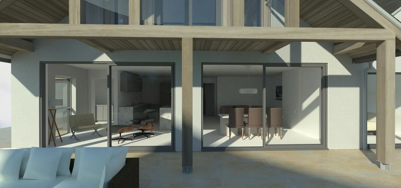 View of a modern house exterior with large sliding glass doors, showing a living room with a chair and small table, and a dining area with a table and chairs inside.
