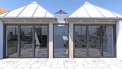 A modern house with large glass sliding doors and a tiled outdoor patio.