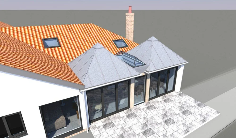 A top view of a modern house with separate sections: one with orange tiled roof, another with gray sloped roof, and a large glass extension with pitch roof, patio in the foreground, and a chimney at the back.