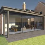 Modern glass house with a patio and lawn