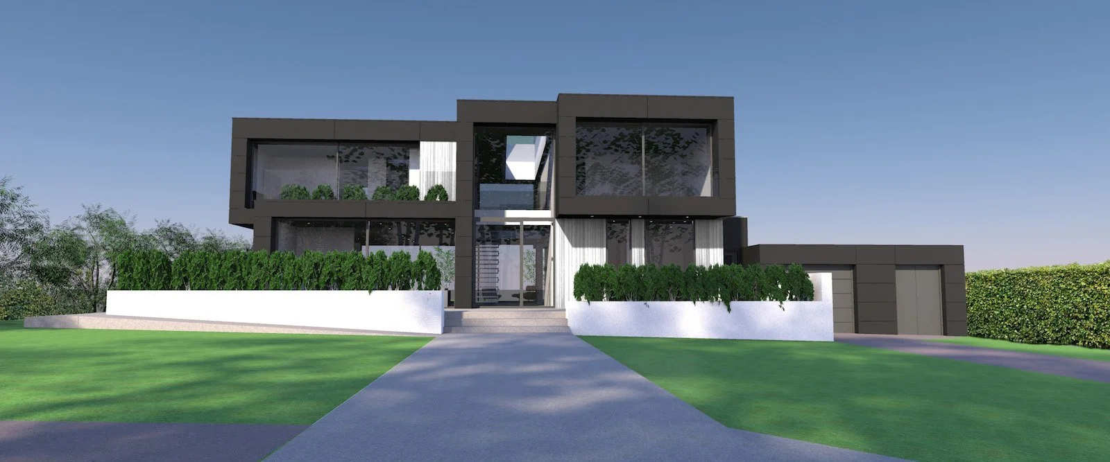 Modern two-story house with black and white exterior, surrounded by green lawn and bushes, under a clear blue sky.