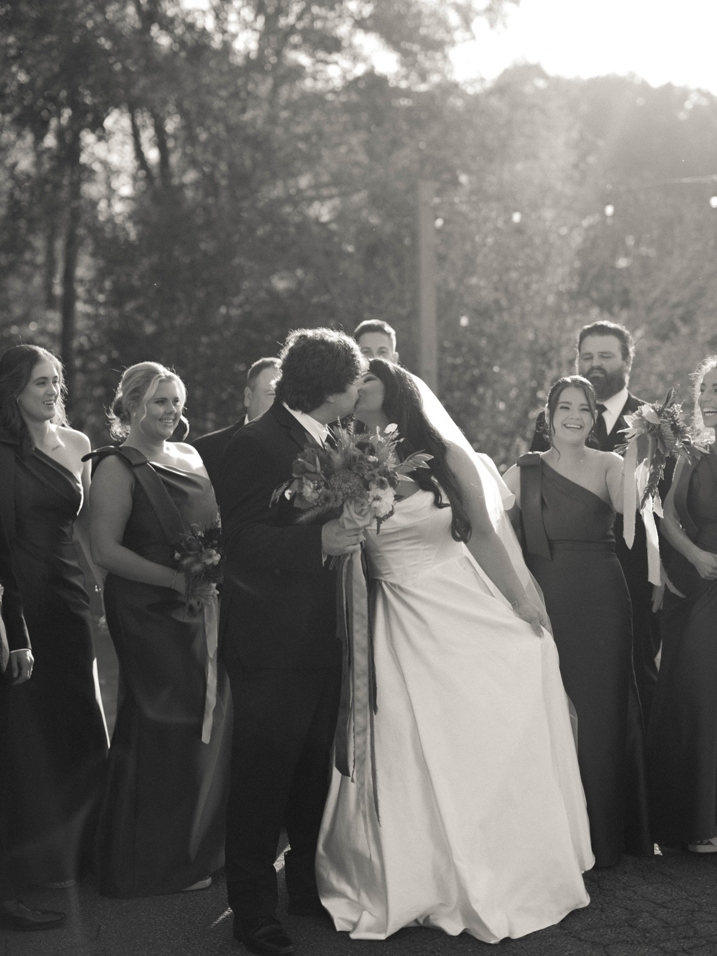 Sealed with a kiss surrounded by their favorite people💌 

Photo: @emilyray.co 
Florals: @tangledrootsfloralco 

#upstatescweddings #greenvillescwedding #weddingplanner #southcarolinawedding #weddingplanning