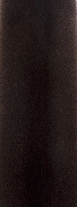 Close-up of a dark brown or black textured fabric surface.