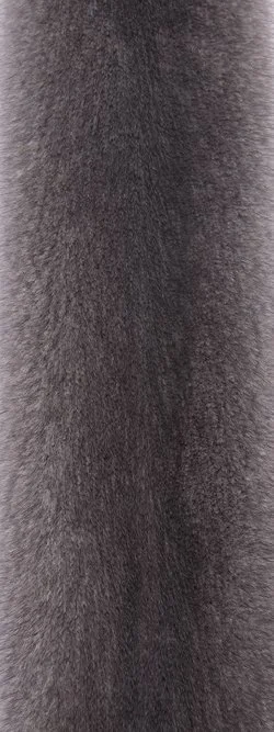 Close-up of dark, textured fur or fabric with a vertical orientation.