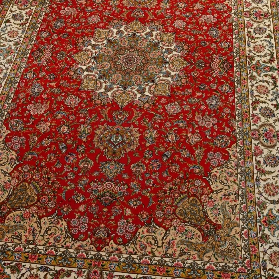 Spotlight on one of our intricately patterned red Persian-style rug with a stunning floral medallion and ornate borders. 

It would look super elegant spread across a marble floor&mdash;perfect for elevating any space. Bring timeless elegance into yo