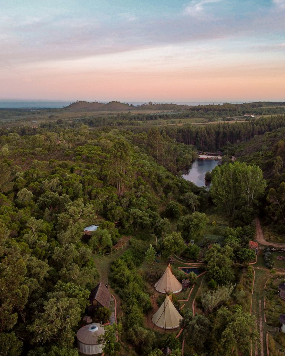 Aerial view of Alentejo Portugal landscape with river, hills, and eco-lodge setting for fermentation residency and food culture experience