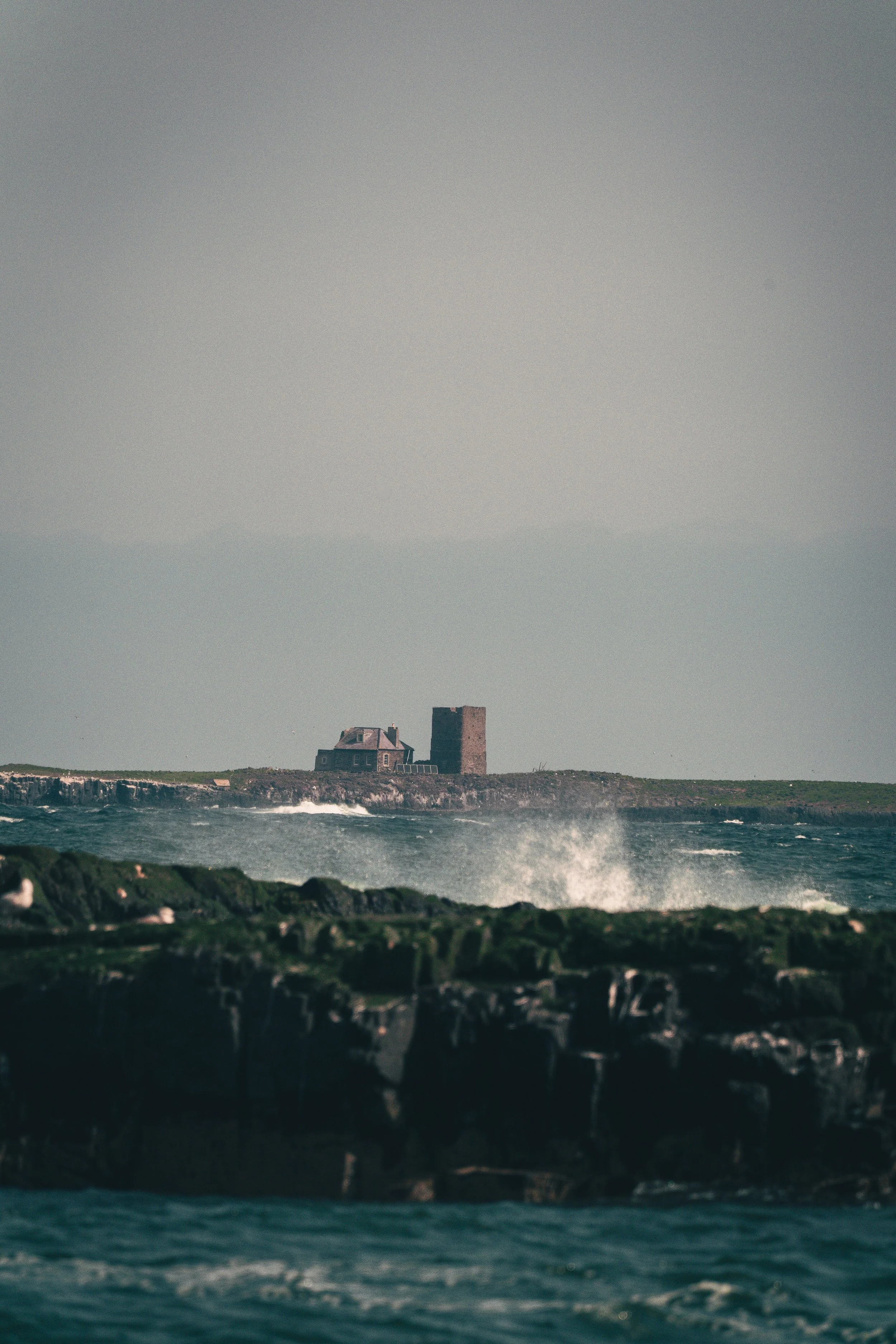 farne-islands-lighthouse-waves-crashing-northumberland-coast.jpg