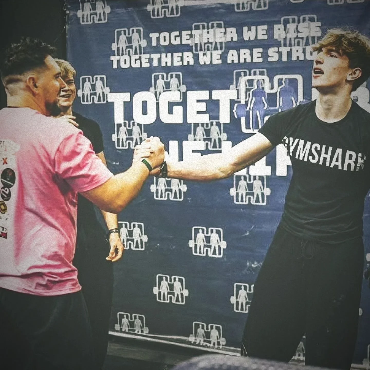 Liam (The founder) shaking hands with young lad after an incredible tandem deadlift attempt