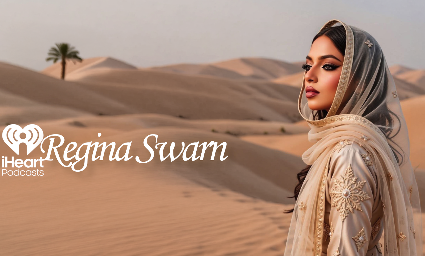 Profile of Regina Swarm, a woman with dark hair, wearing an intricate beige head covering embroidered with gold and floral patterns, standing in a desert with sand dunes and a lone palm tree in the background, for iHeart Podcasts.