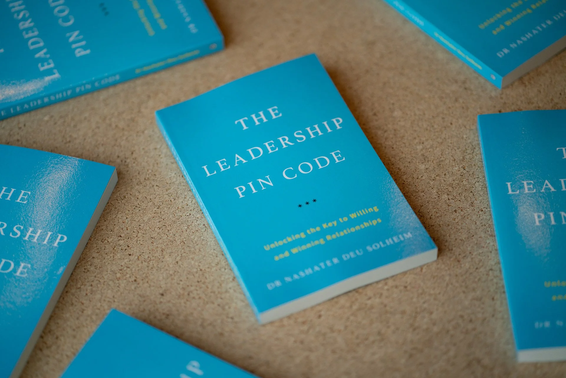 Copies of The Leadership PIN Code arranged on a table