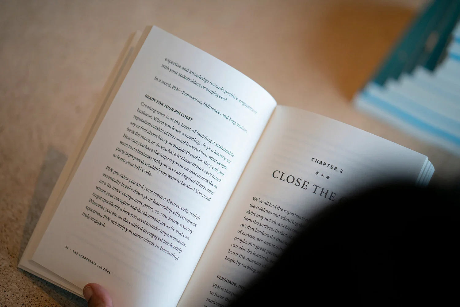 Open pages of The Leadership PIN Code