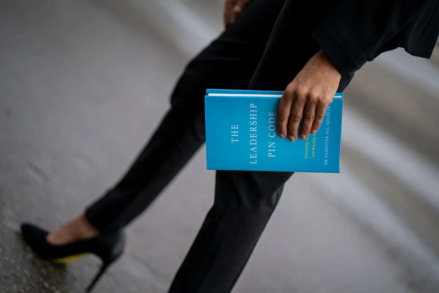 The Leadership PIN Code by Dr. Nashater Deu Solheim, held by a reader