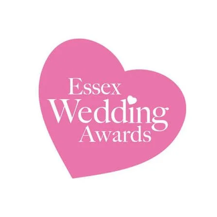 Pink heart-shaped logo with white text that reads 'Essex Wedding Awards'
