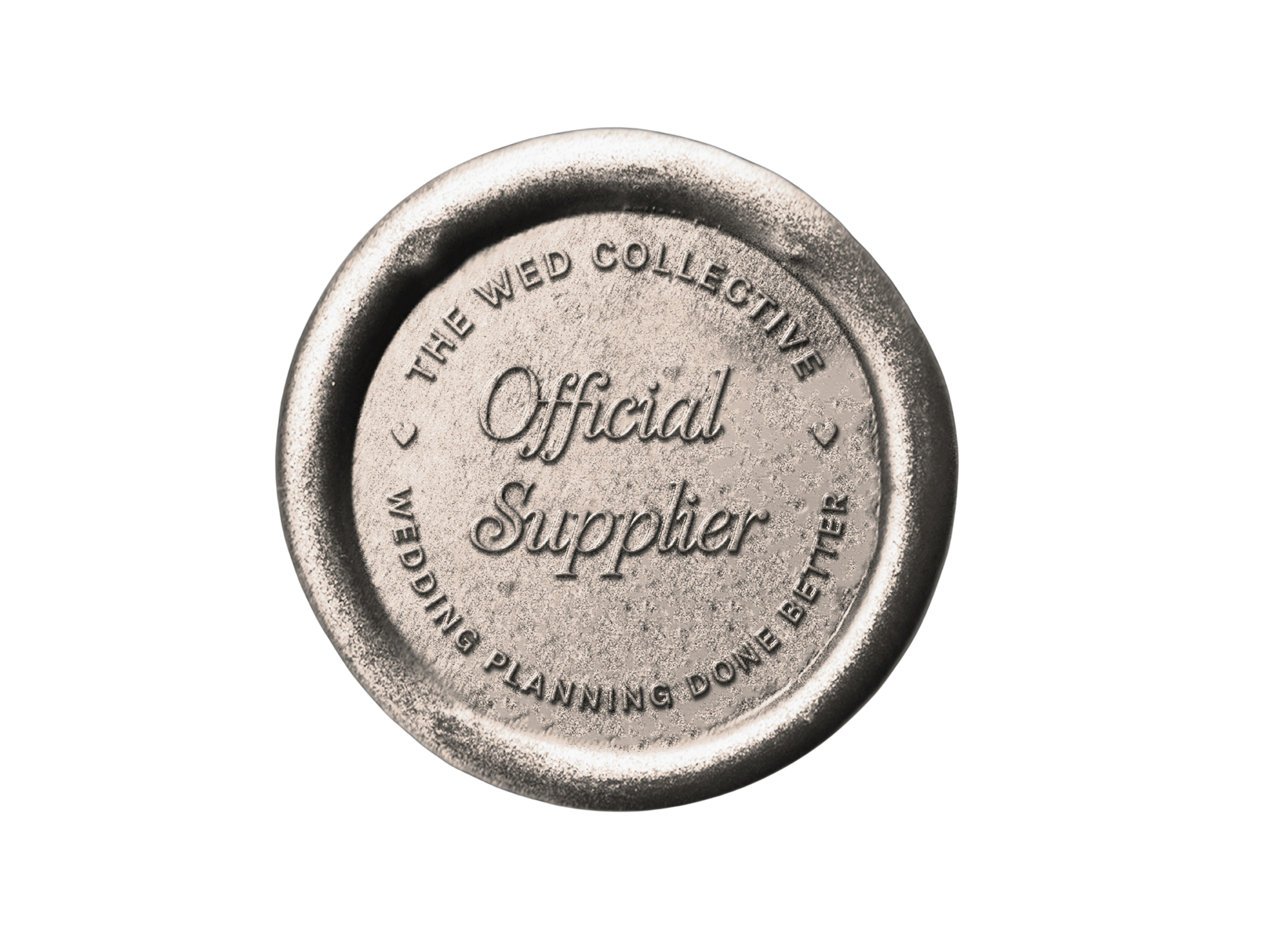 A circular metallic embossing stamp with the words 'THE WED COLLECTIVE' and 'OFFICIAL' visible, used for branding or sealing.
