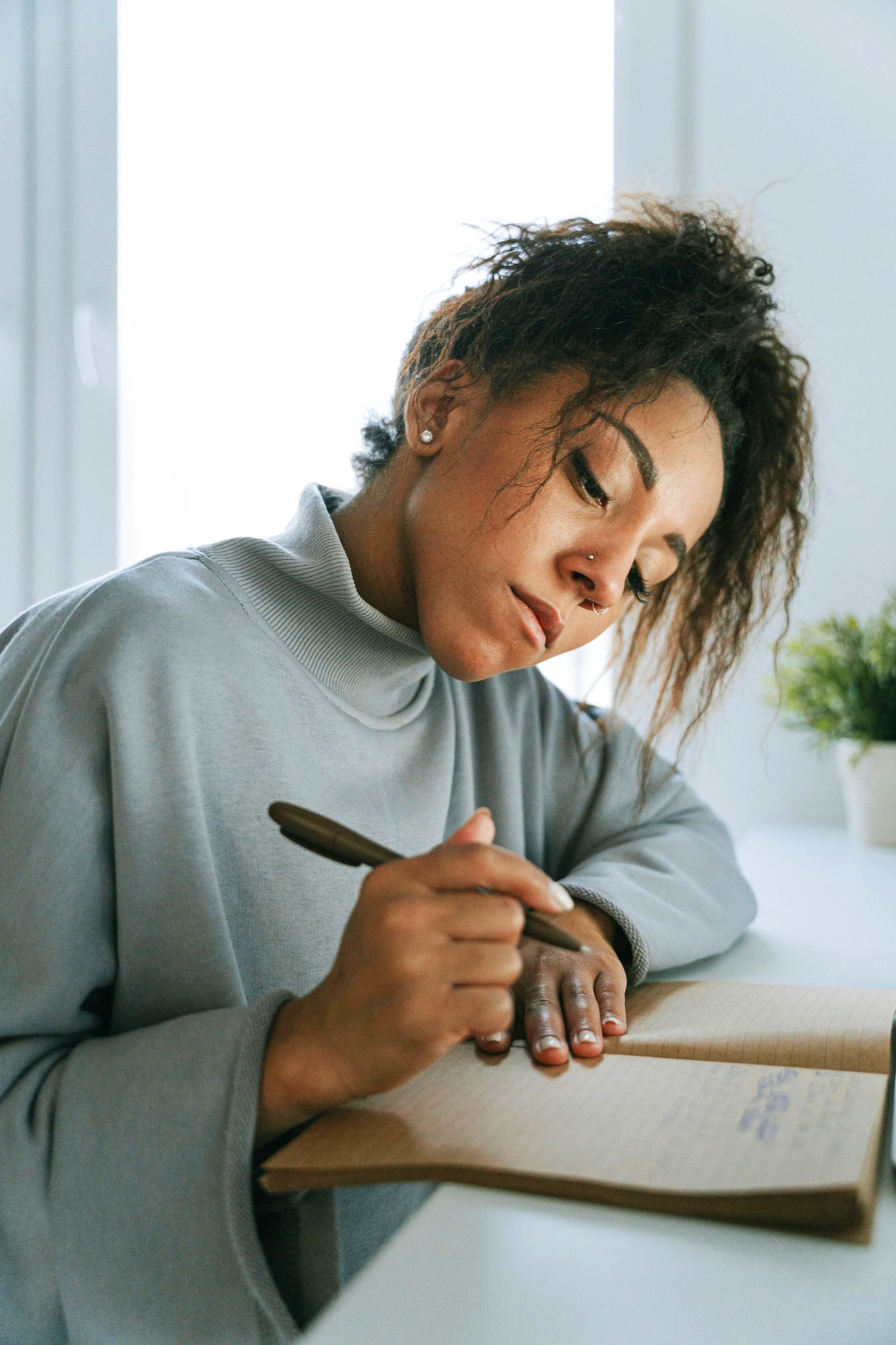 Photo of Latina journaling