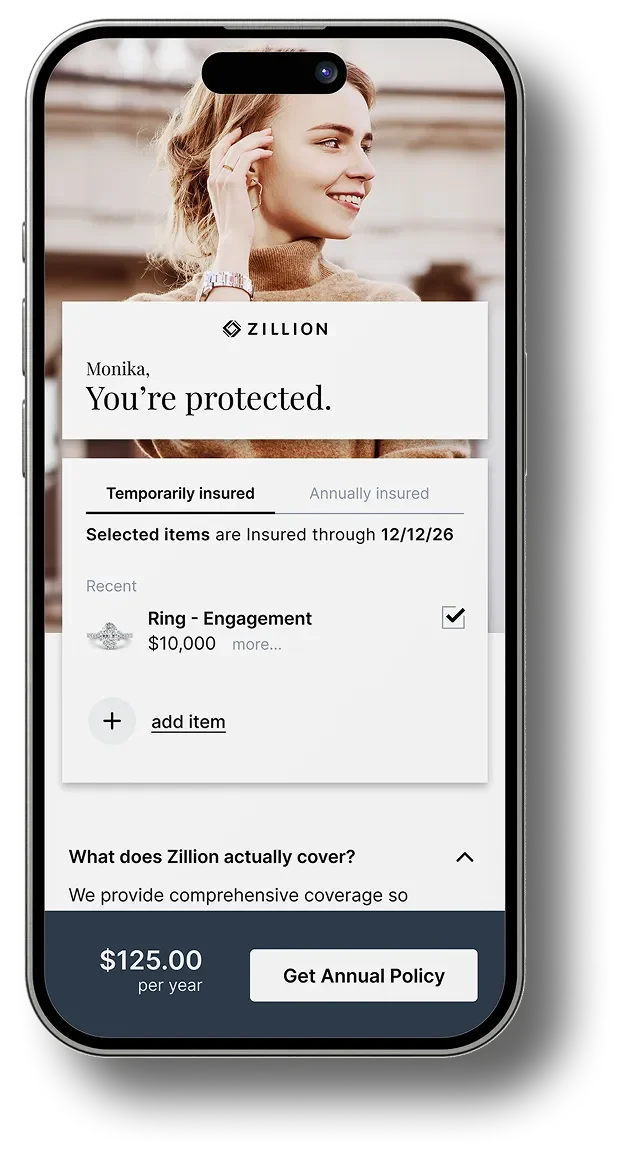A woman with blonde hair wearing a brown turtleneck sweater smiling and looking to the side on a smartphone screen displaying an insurance policy for Zillion that protects against a $10,000 engagement ring, costing $125 annually.
