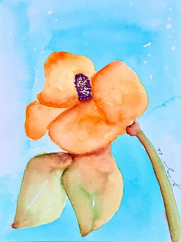 Watercolor painting of an orange flower with green leaves on a blue background.