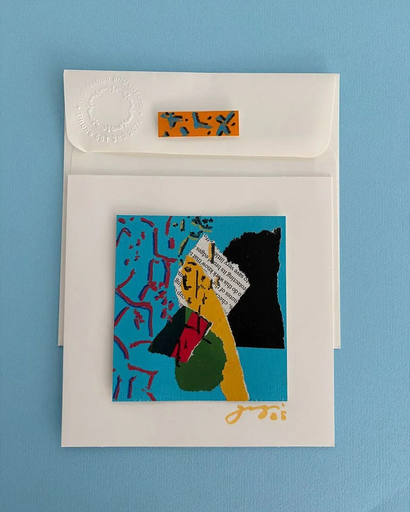 Colorful abstract art with various shapes and patterns on a blue background, placed inside a white envelope.
