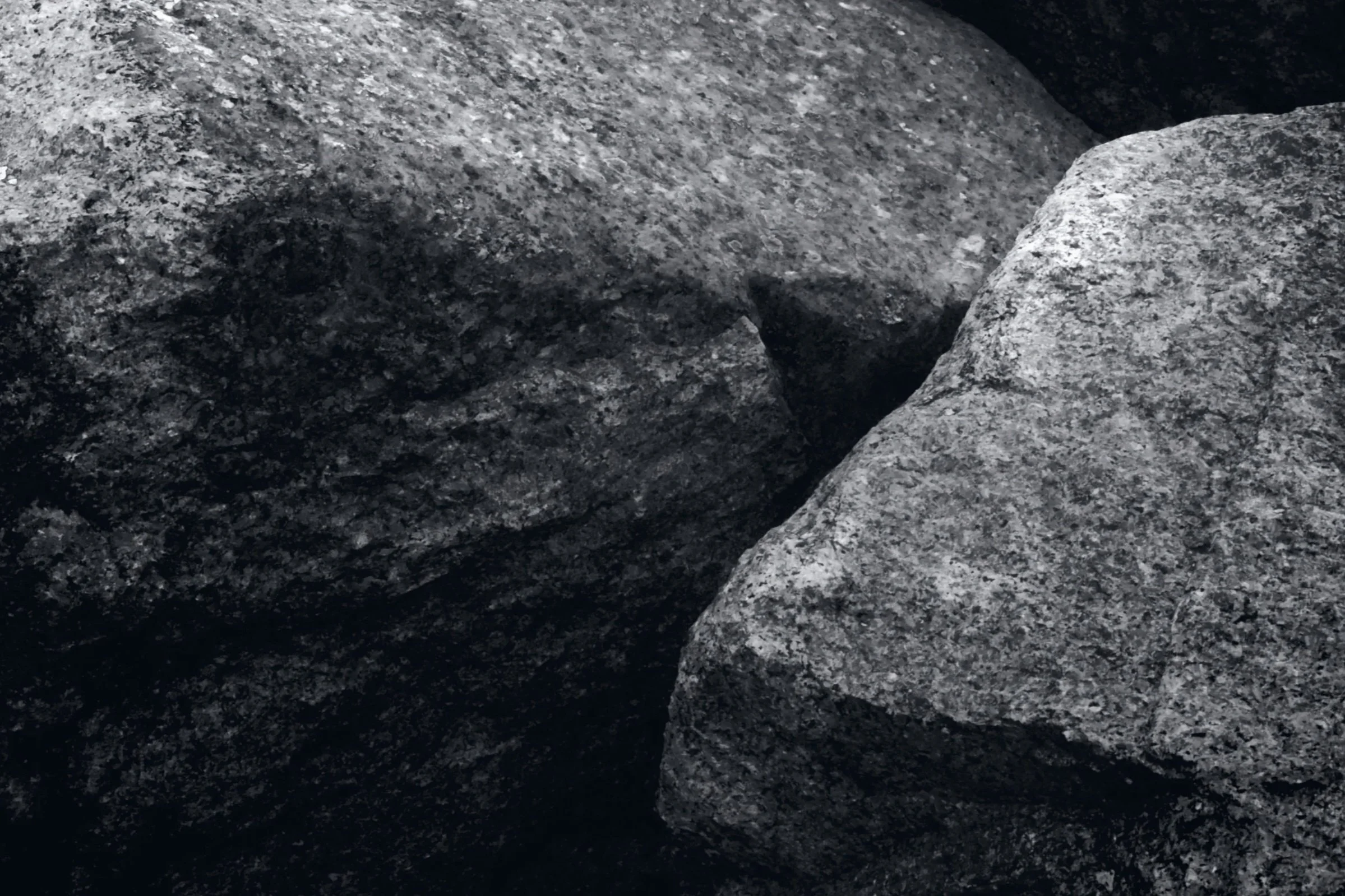 Close-up of several gray rocks.