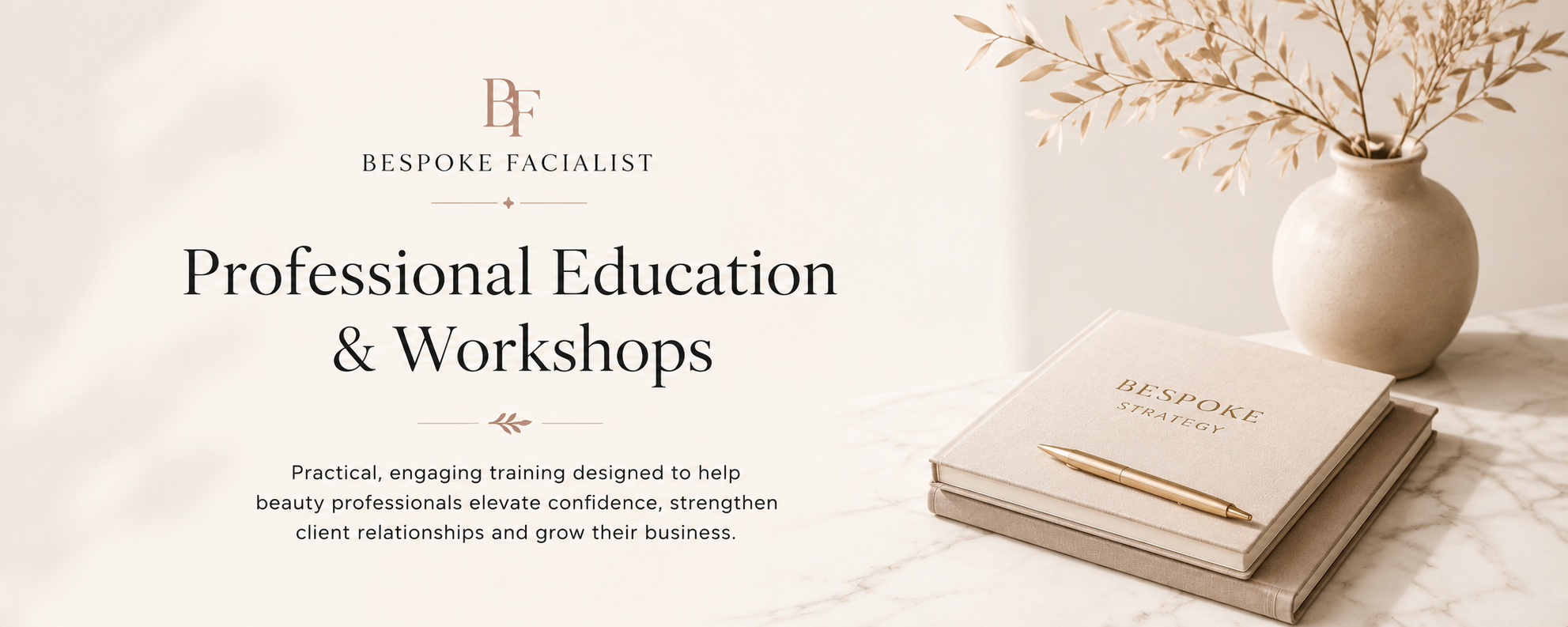 A promotional image for bespoke facialist professional education and workshops featuring a vase with beige leaves, a beige notebook labeled 'Bespoke Strategy', a matching beige book, and a gold pen on a marble surface with a soft beige background.