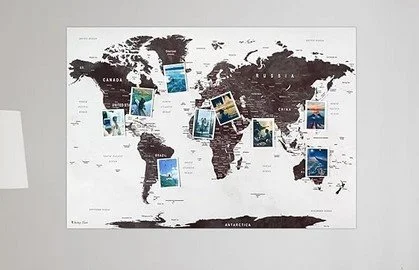 World map with photos attached showing various landscapes and landmarks.