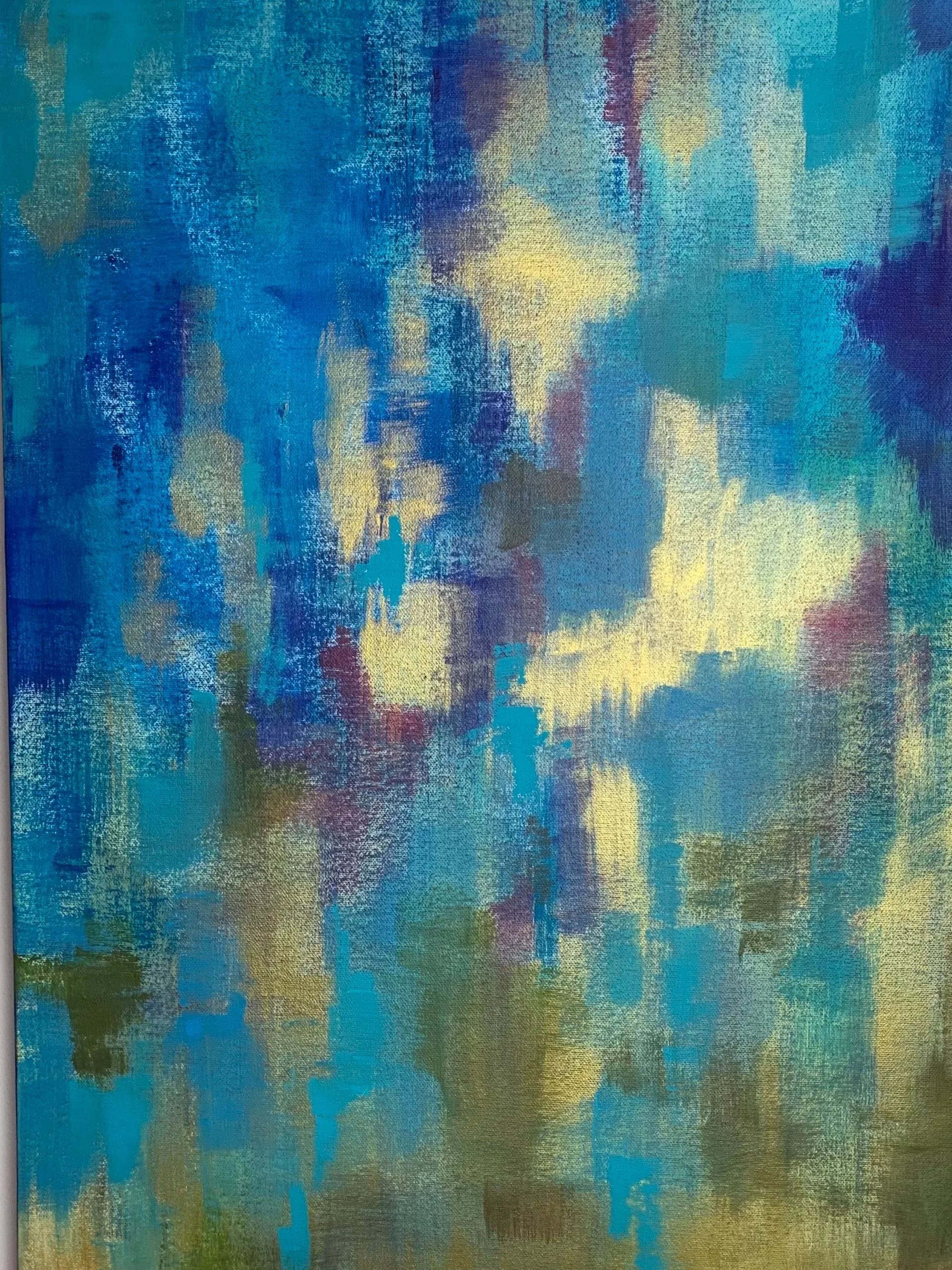Abstract painting with shades of blue, yellow, purple, and green. Brushstrokes create a textured, layered appearance.