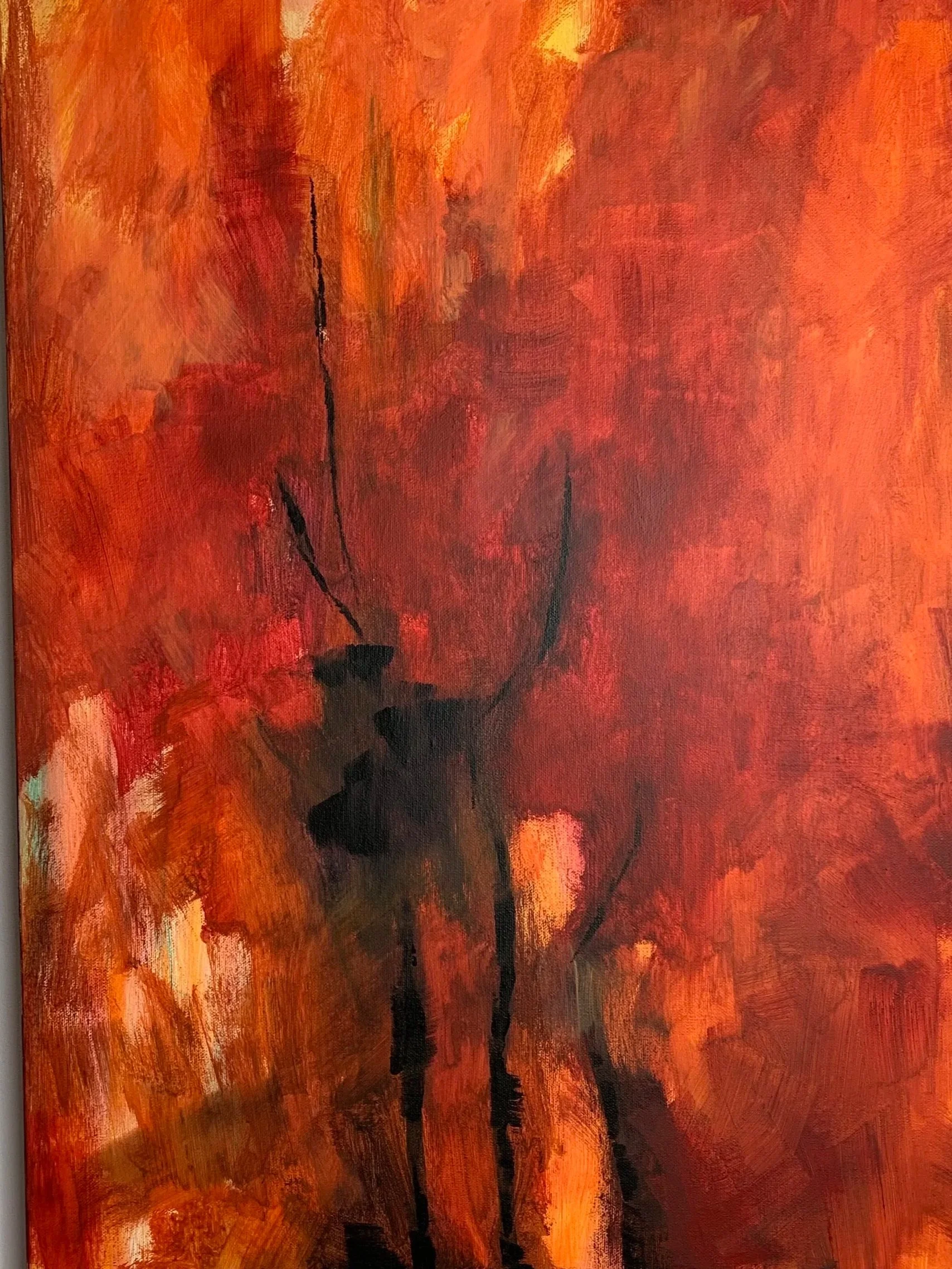 An abstract painting featuring warm shades of orange, red, and black, with rough brushstrokes and darker lines forming vague plant-like shapes.
