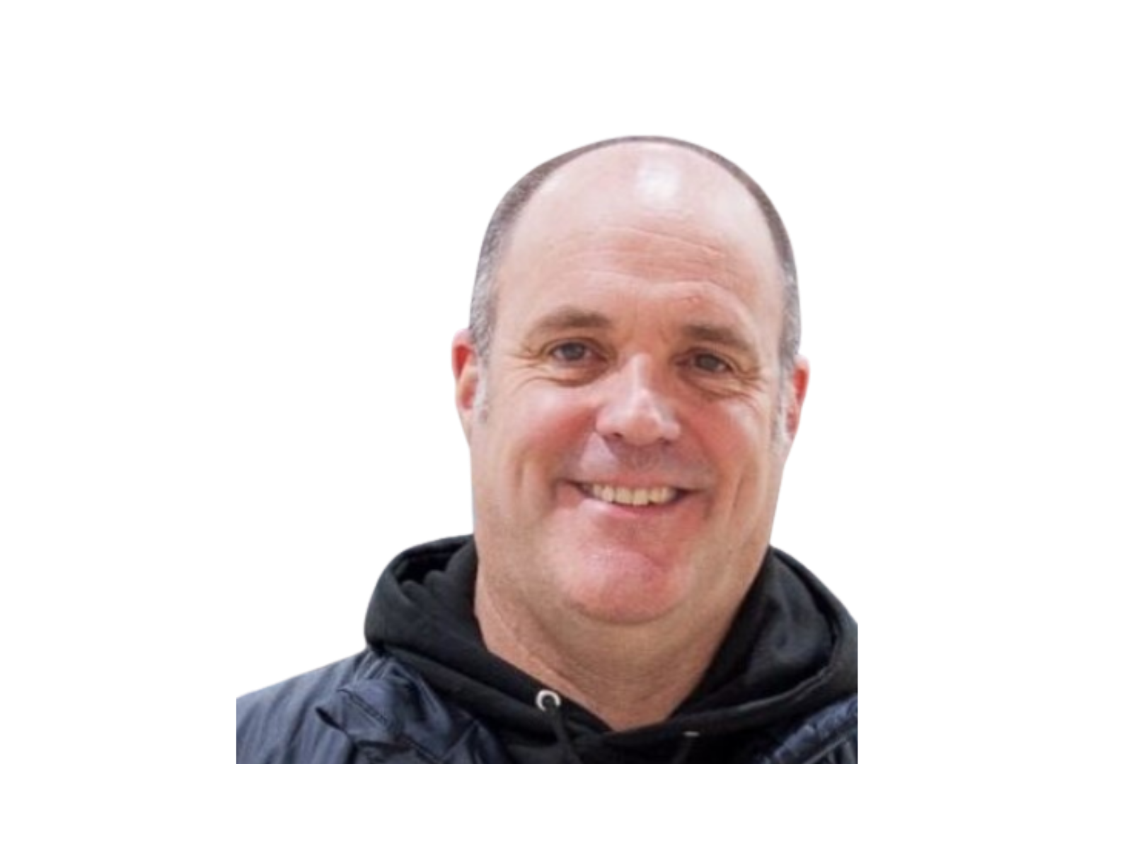 A smiling man with a receding hairline, wearing a black hoodie and a dark blue jacket.