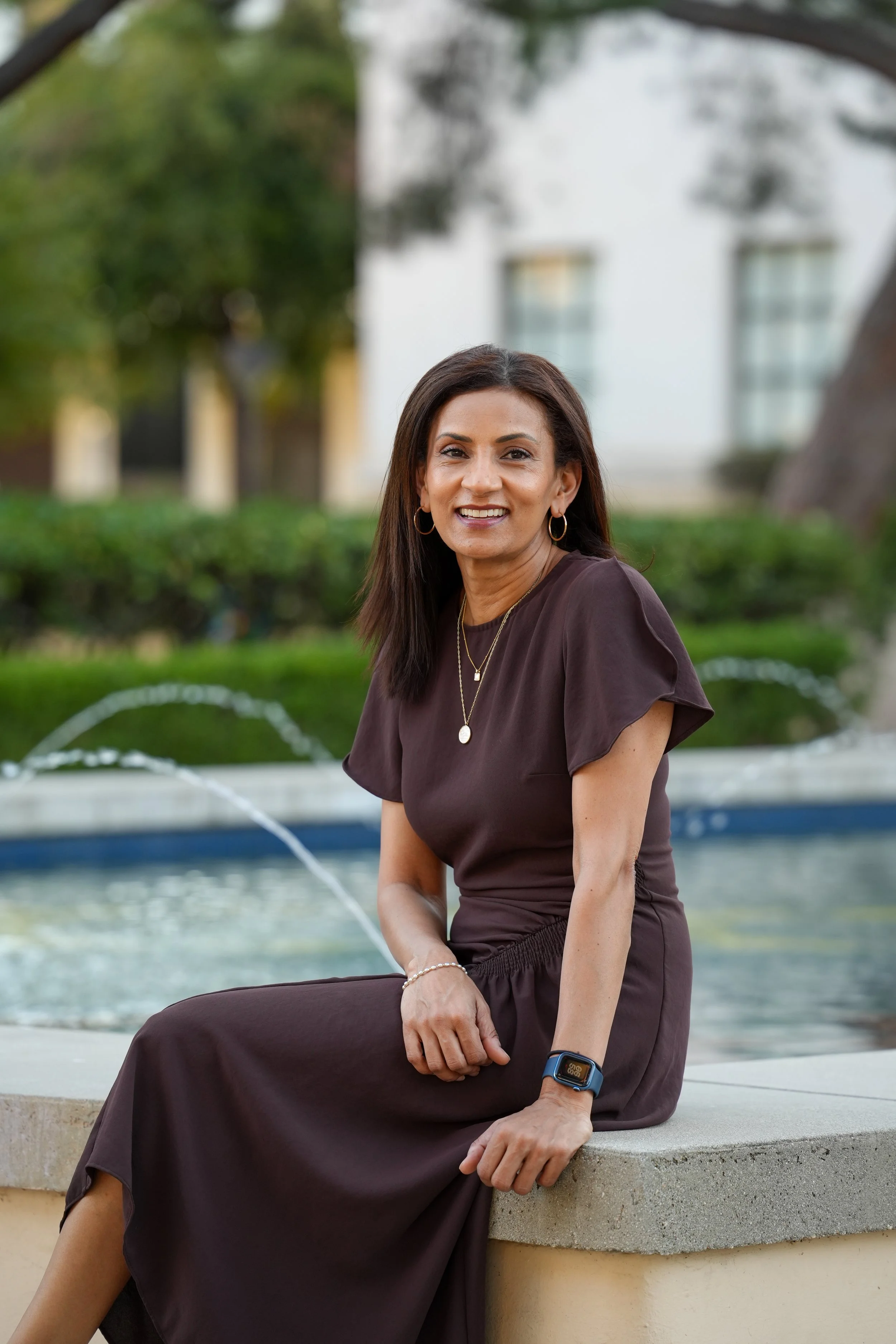 Poornima professional headshot - water feature.