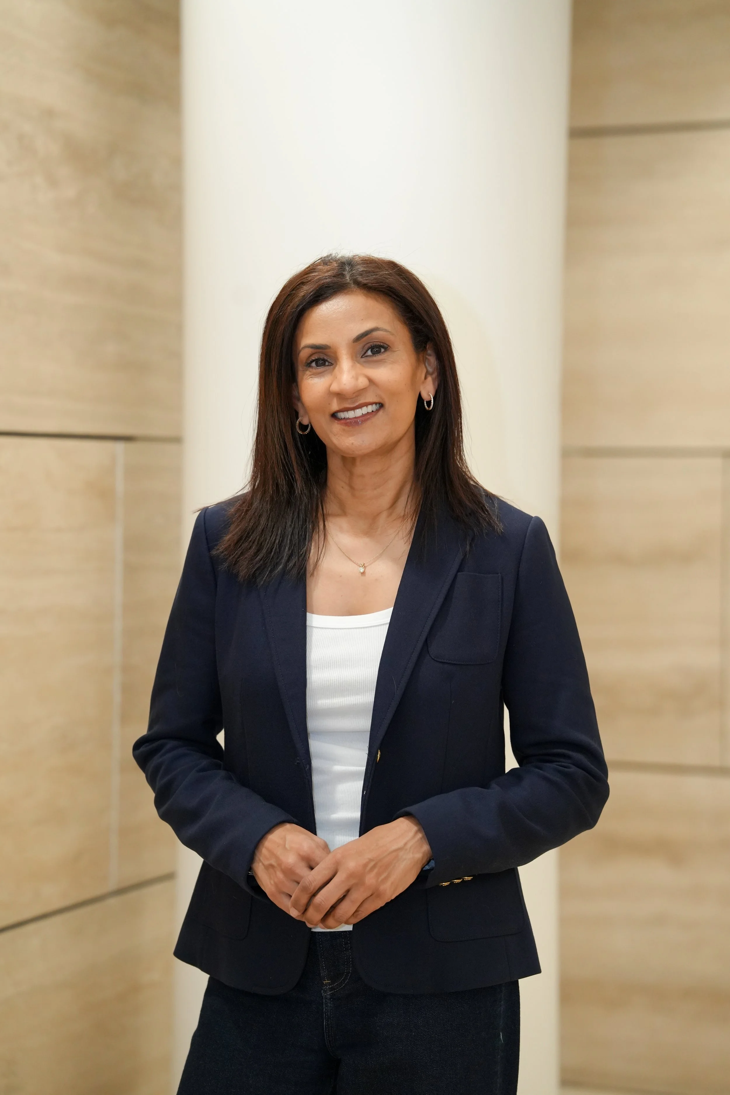 Poornima professional headshot - indoors.