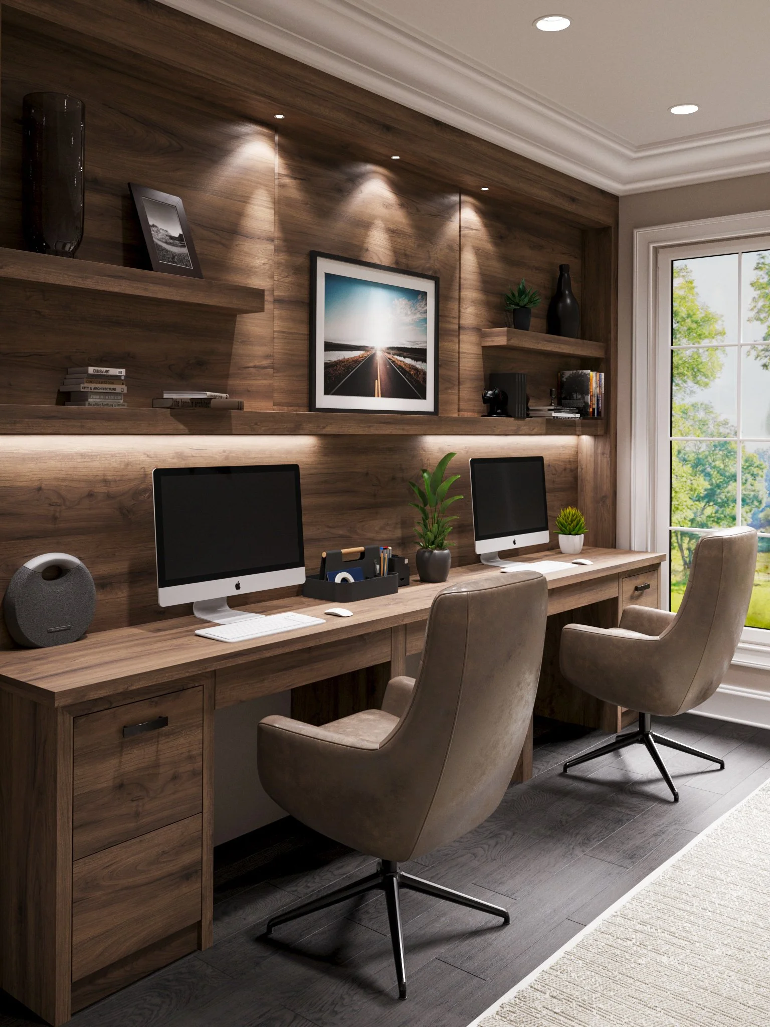 Home office with two desktop computers on a long wooden desk, beige swivel chairs, and a large window showing green trees outside. Wooden shelves with decor and books are mounted on a wood-paneled wall.