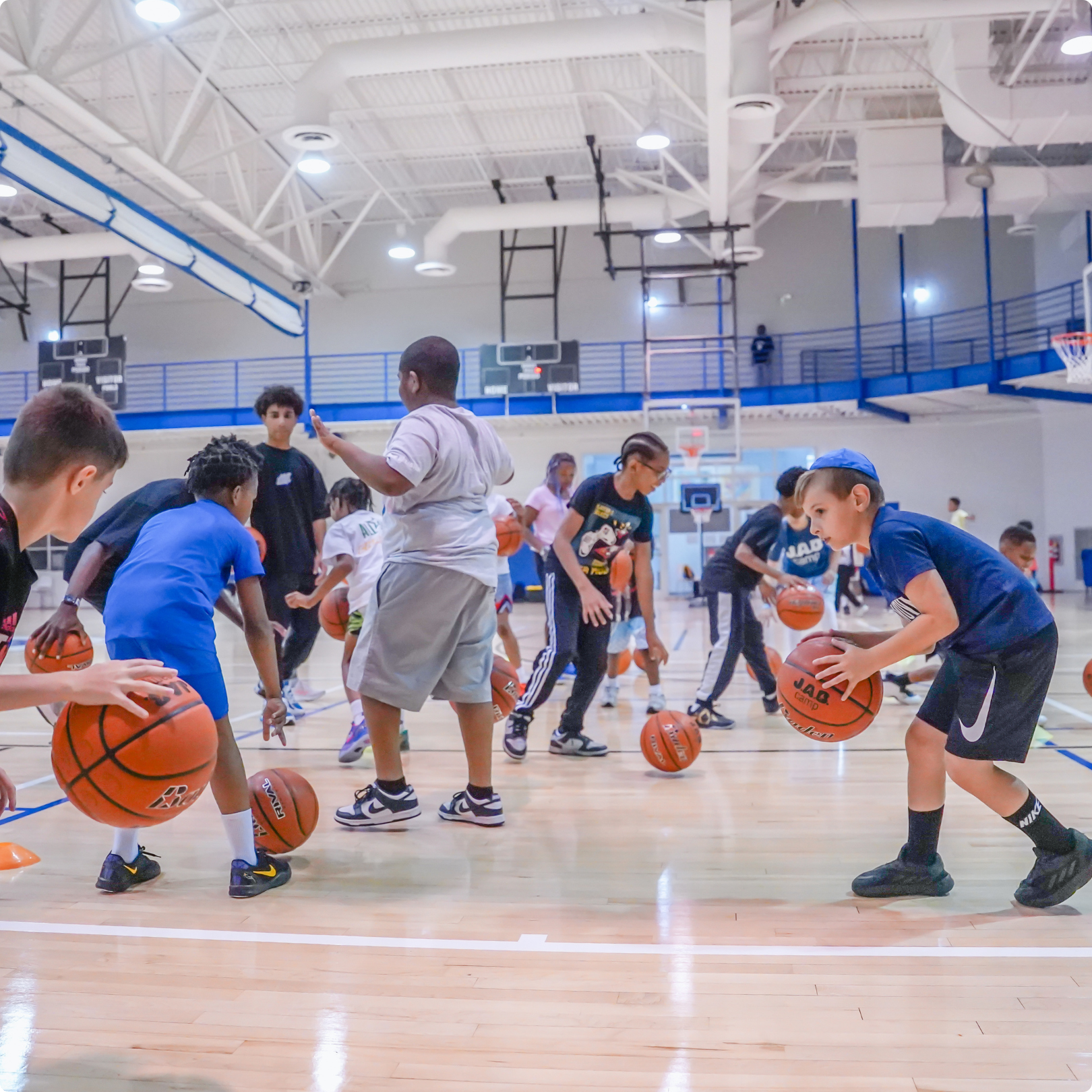 Youth basketball training session at JAB Courts indoor facility helping kids build skills, confidence, and teamwork