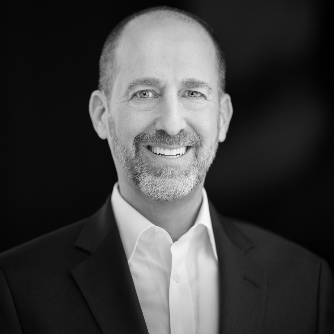 Brian Shankman of a smiling business leader in suit, representing partnership, leadership, and support behind JAB Courts mission