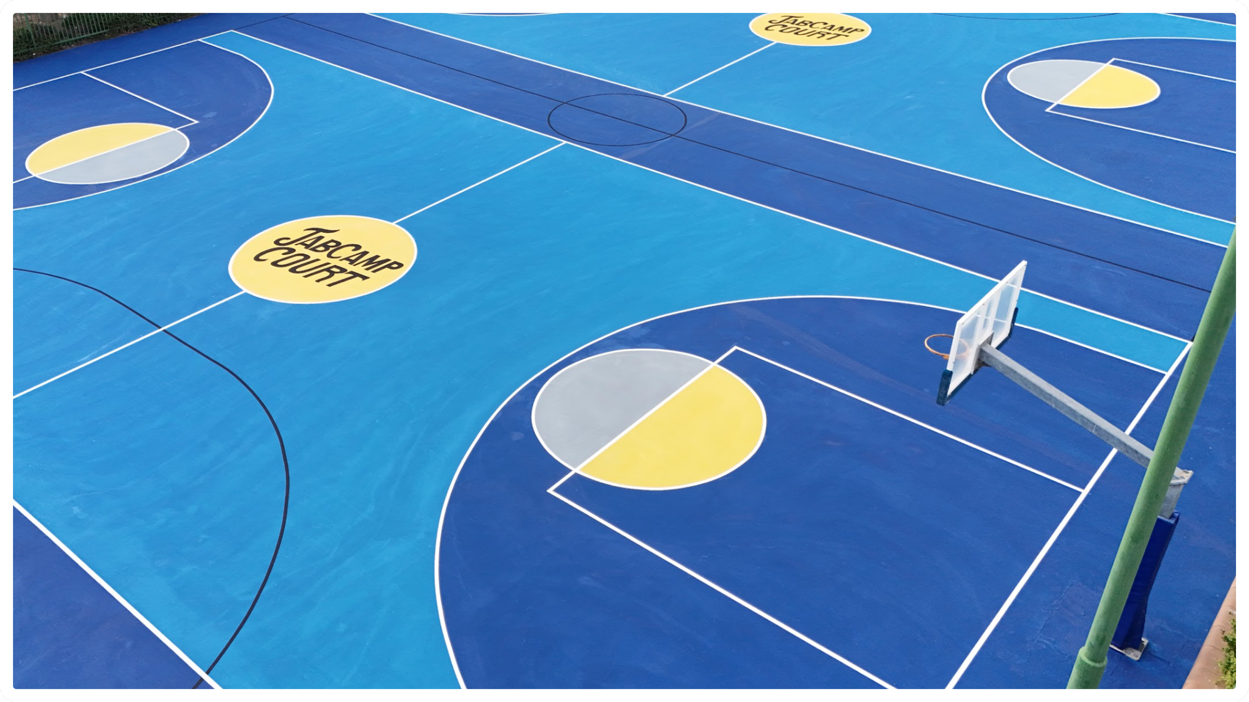 Renovated covered basketball court by JAB Courts supporting year-round youth development and play