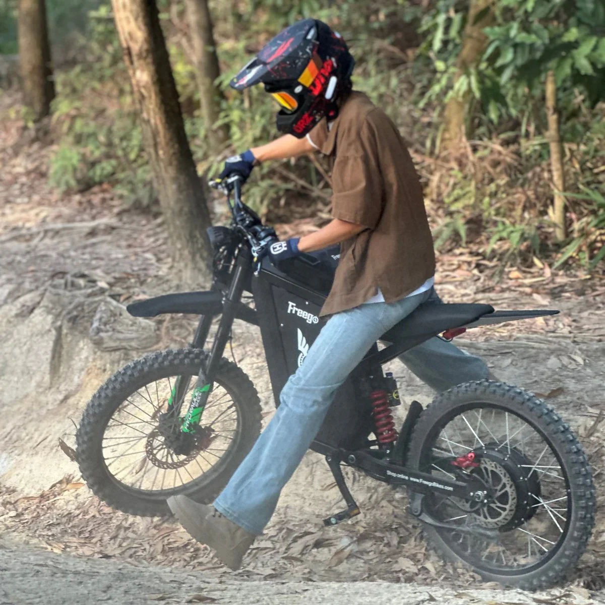 freego-x3-all-terrain-electric-dirt-bike-wooded-trail-scene.jpg.webp