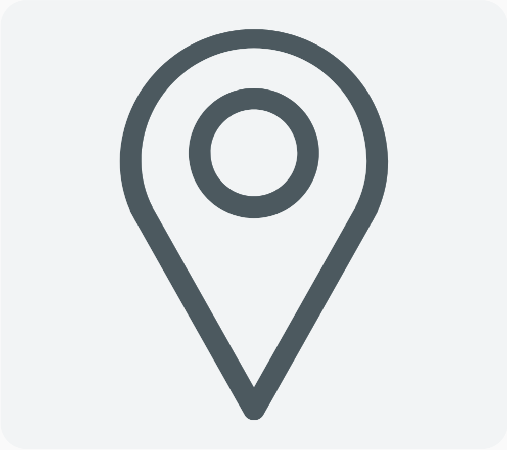 A gray map marker icon on a light background.