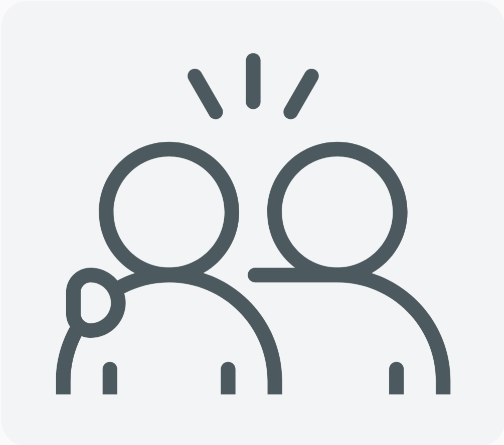 Line drawing of two people, one with a hand on the other's shoulder and lines above their heads indicating surprise or excitement.